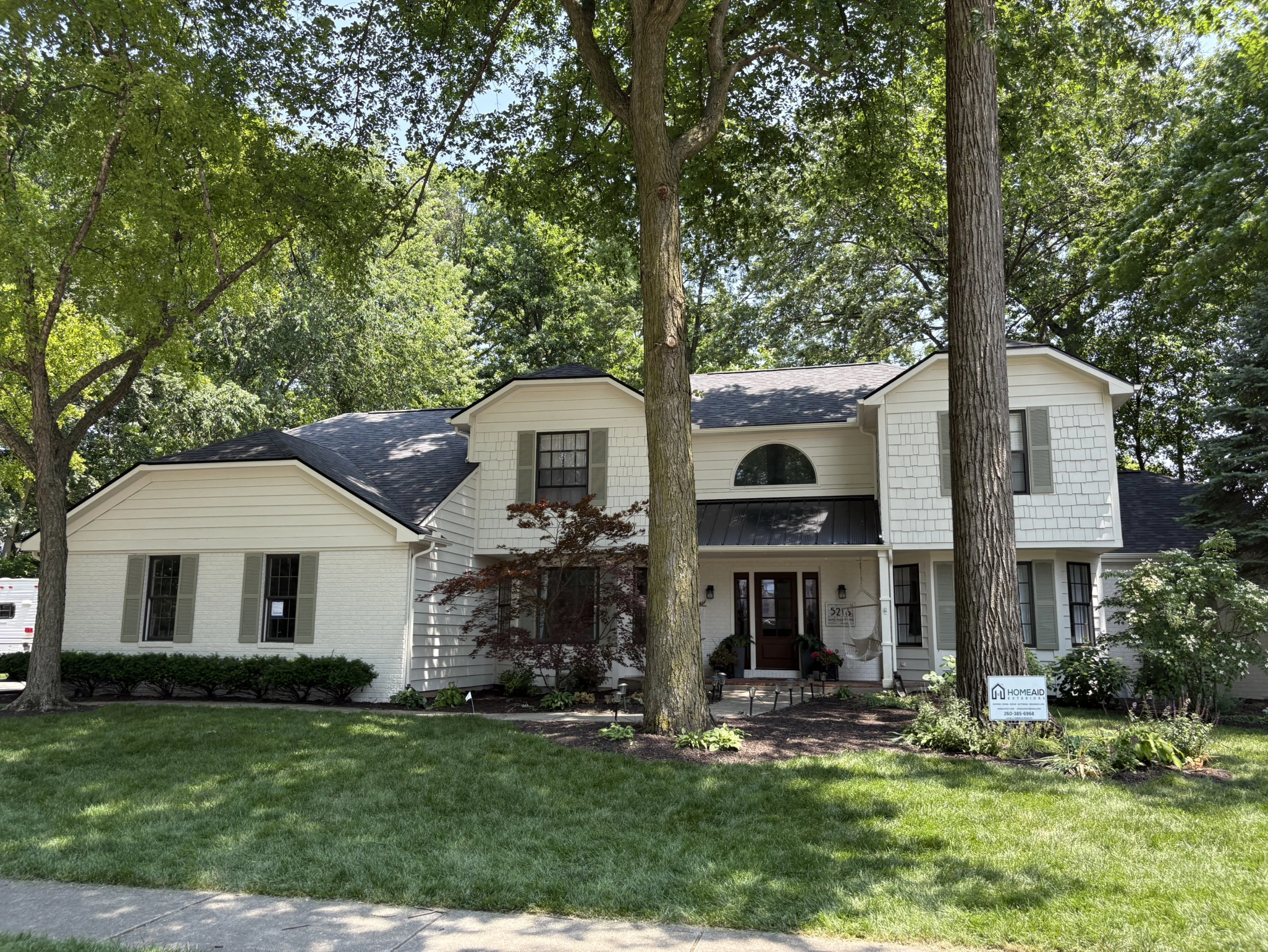 Two-story home with new roof