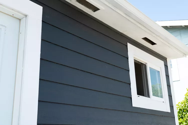 Fiber cement siding with white trim