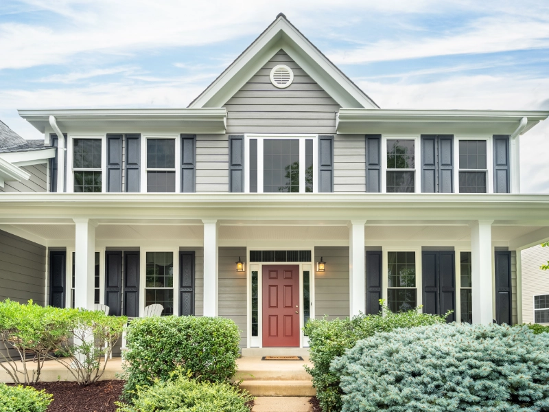 Completed siding installation on colonial home