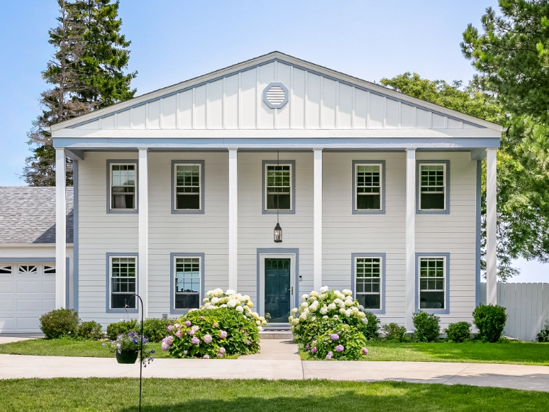 Traditional colonial home with James Hardie siding and white trim